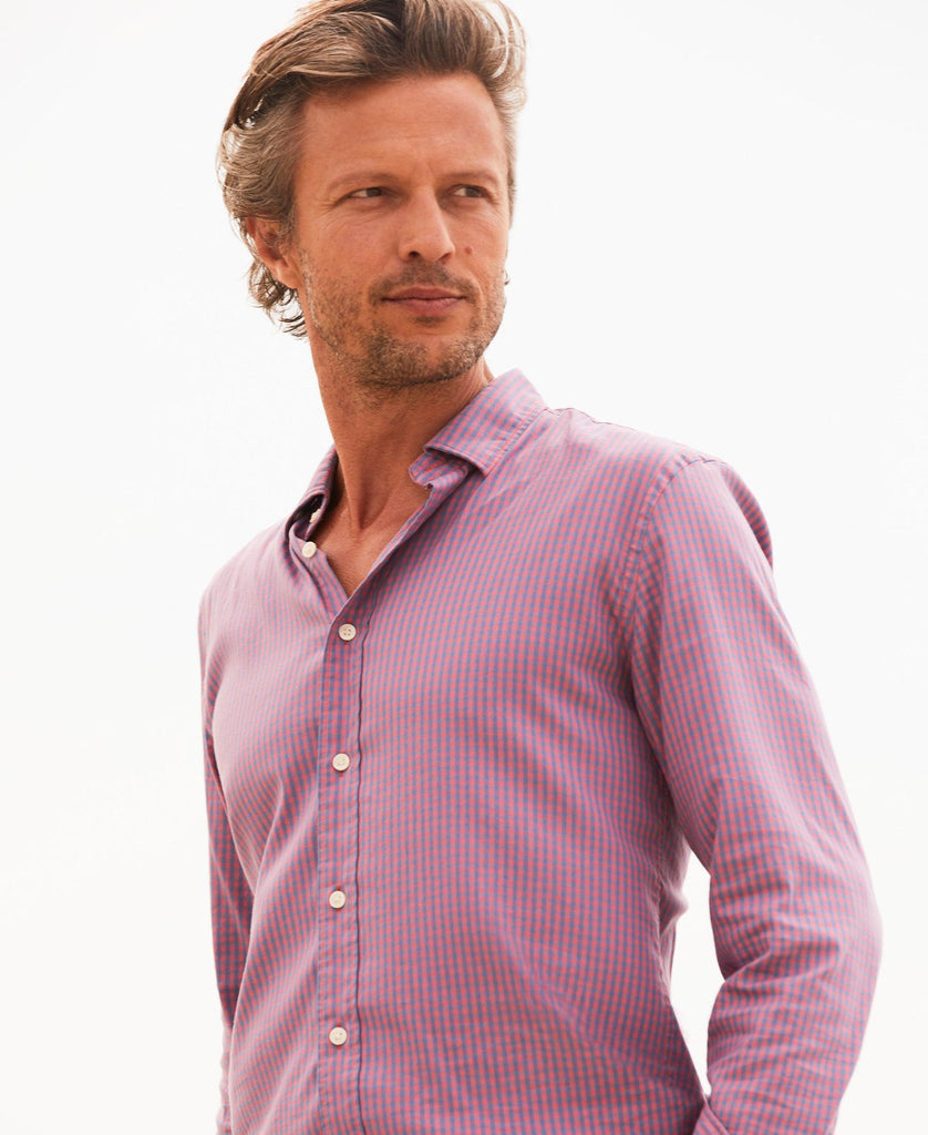 http://fahertybrand.com/cdn/shop/files/FA23-faherty-mens-MWF2308-BGA-the-movement-shirt-blue-rose-gingham_lead_lifestyle1_1024x1024.jpg?v=1695305826