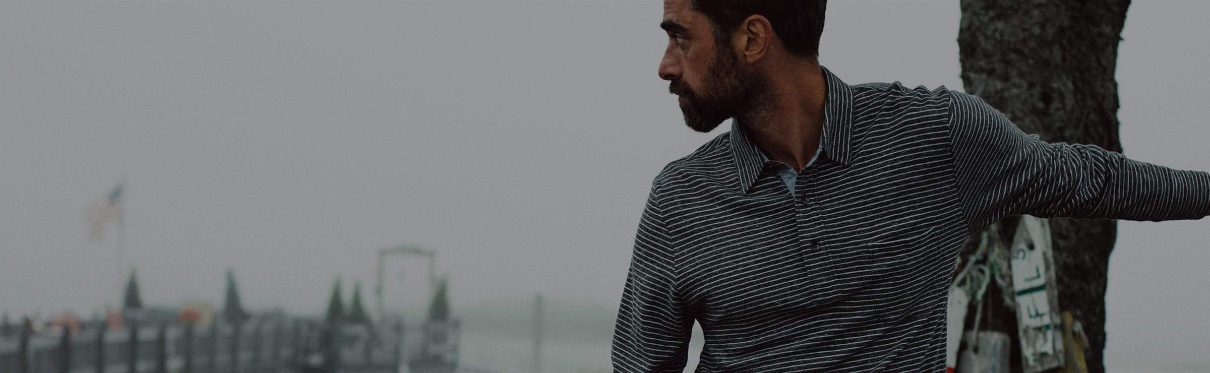 man wearing a long sleeve Faherty brand polo 