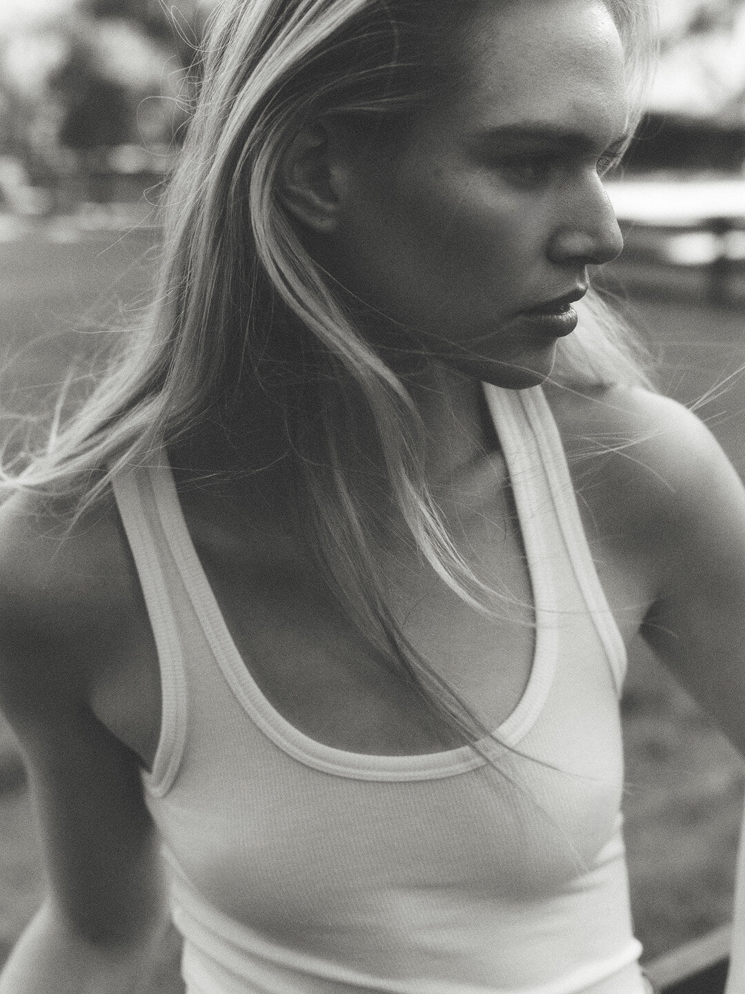 Female model wearing a cotton tank top