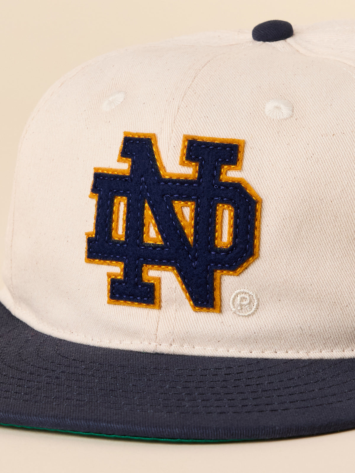 Close up of a natural and navy Notre Dame ballcap, image 3 of 3