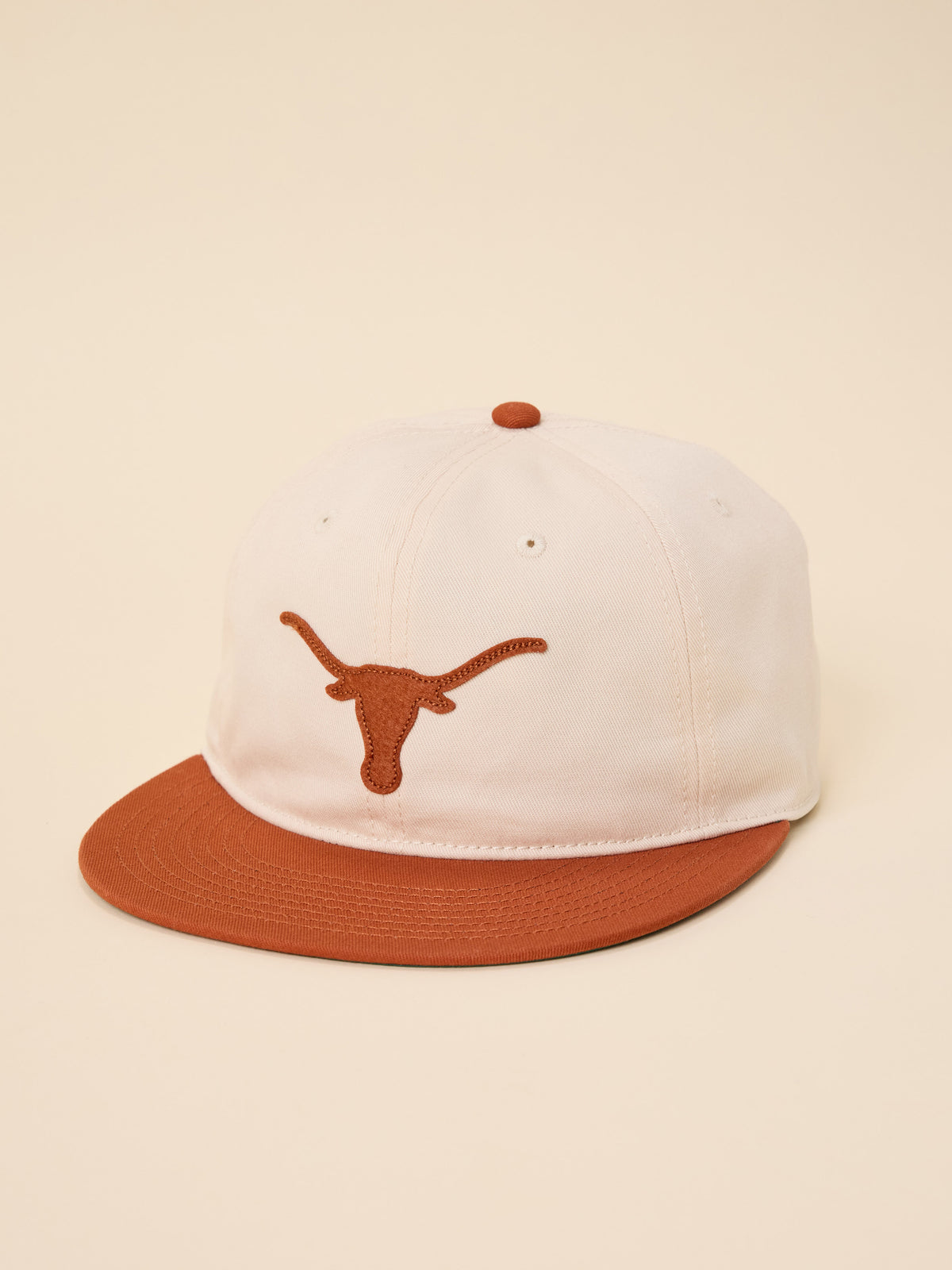 A beige and orange University of Texas Austin hat, image 1 of 3