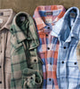 4 of The Softest, Most Comfortable Flannels Ever, Made by Faherty Brand, on a table