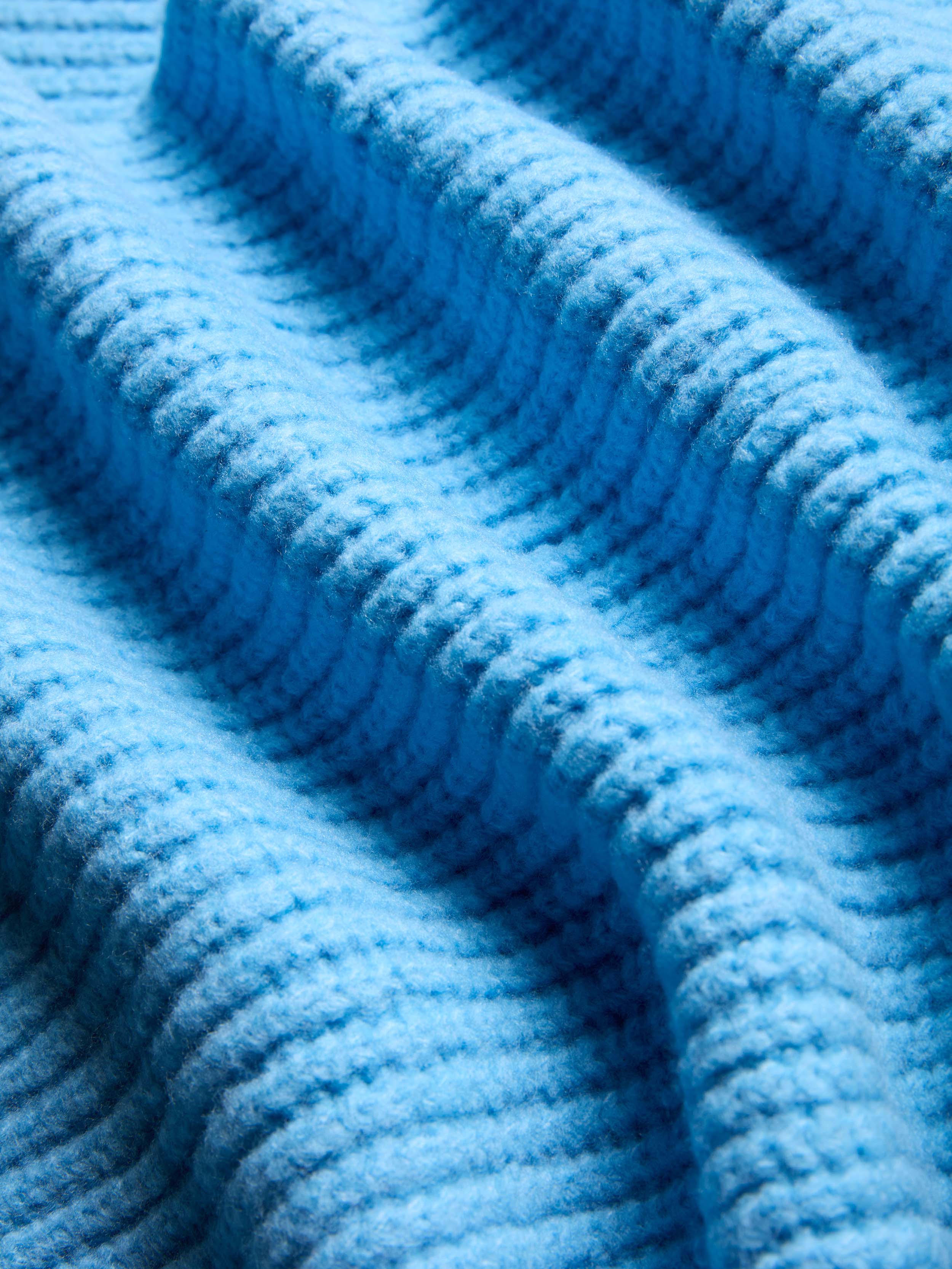 Close-up of blue knitted fabric
