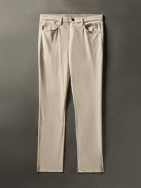 Flat lay image of the Movement 5-pocket pant in Light sand