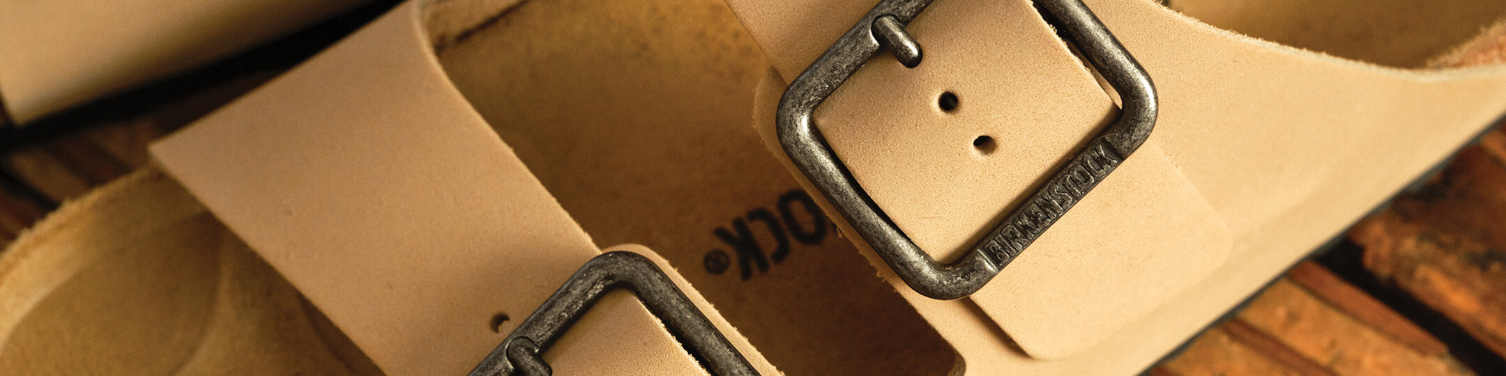 A close up of a pair of Faherty + Birkenstock Arizona Wire Sandals