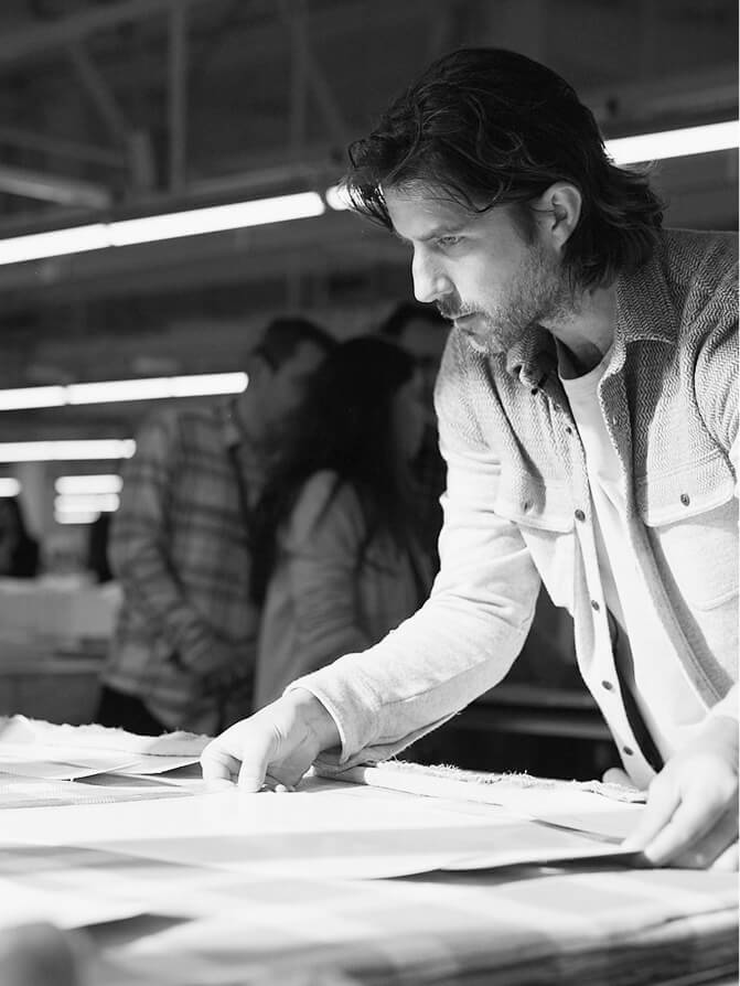 Mike Faherty at a factory in Turkey working on the pattern of the legend sweater shirt