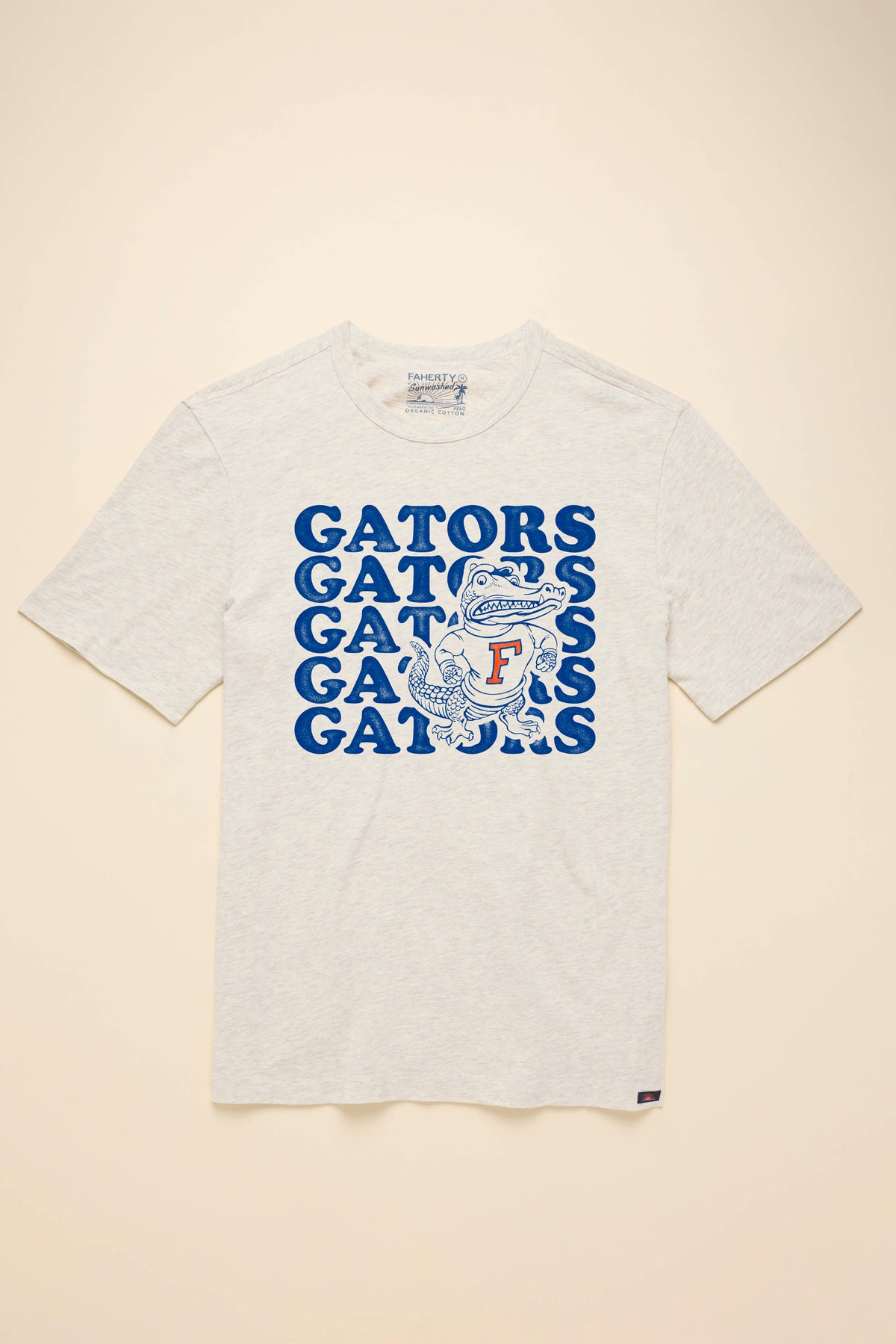 A white short-sleeve t-shirt with University of Florida graphic at the center front against a beige background, image 3 of 3