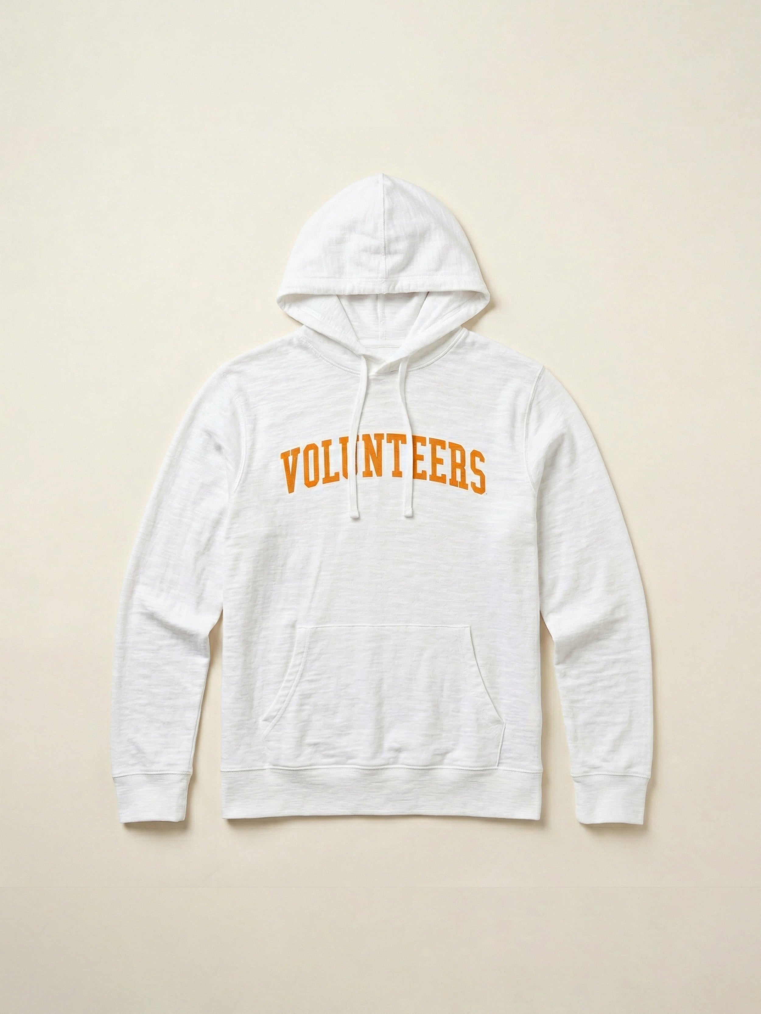 White hoodie with University of Tennessee Volunteers text on the center front against a beige background