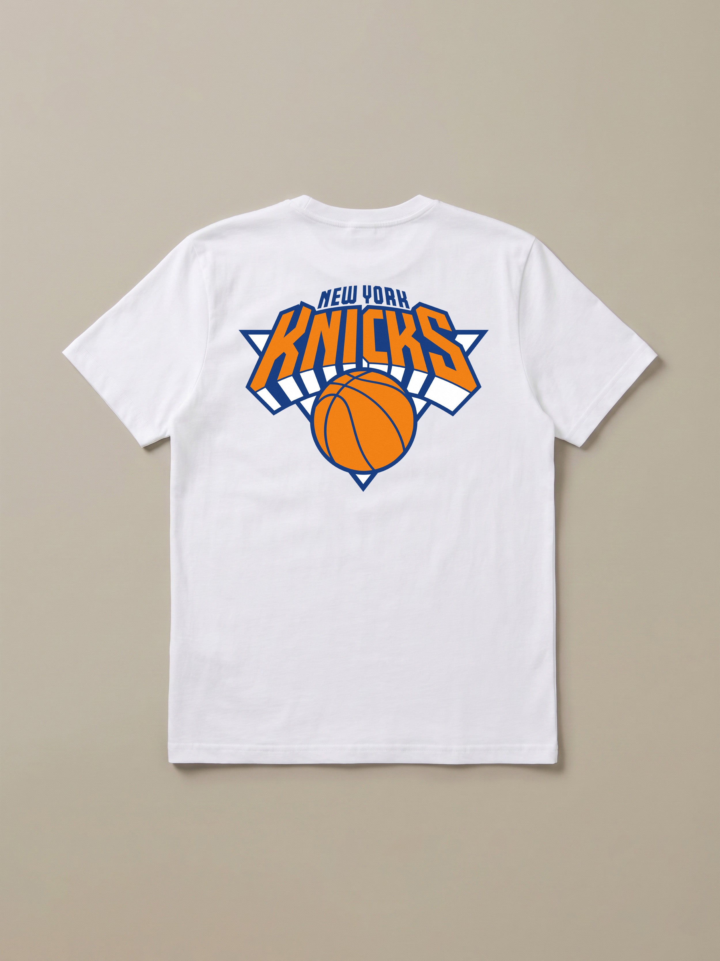White t-shirt with New York Knicks graphic logo against a beige background