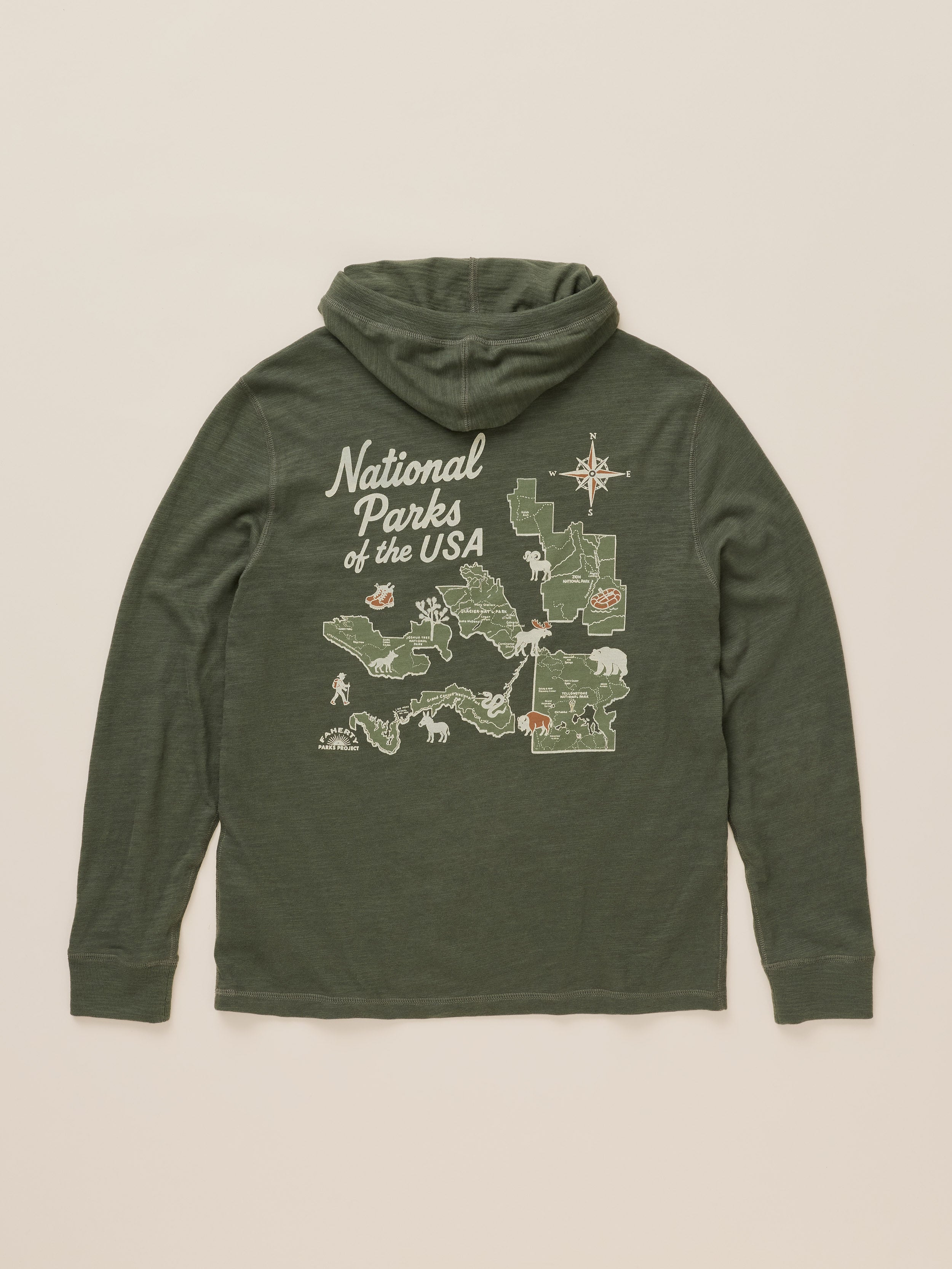 An olive green hooded sweatshirt shown flat against a light beige background, featuring a graphic print on the front that reads 'National Parks of the USA' with a map and outdoor illustrations.