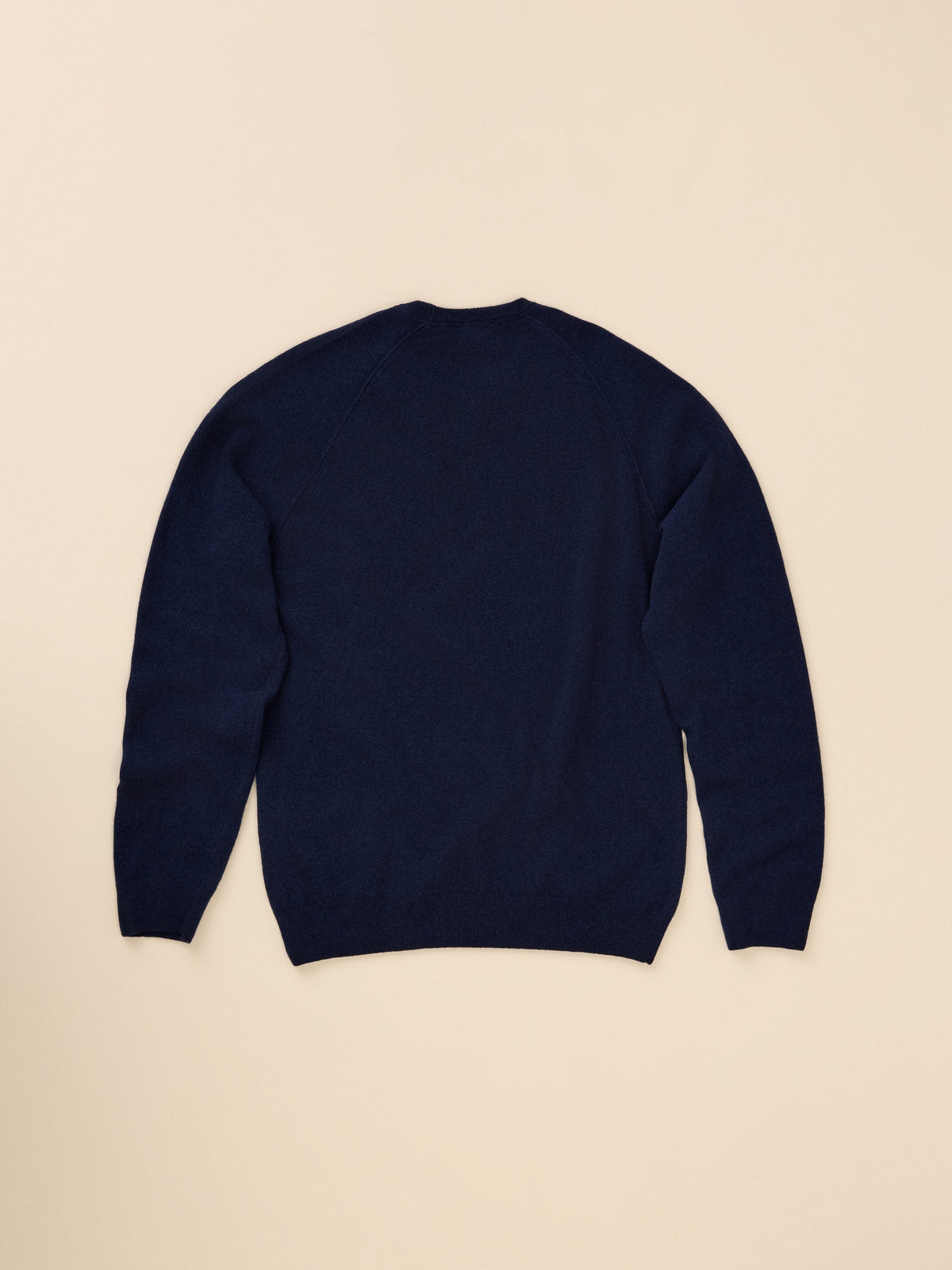 A navy blue long-sleeve knit sweater shown from the back, image 7 of 7