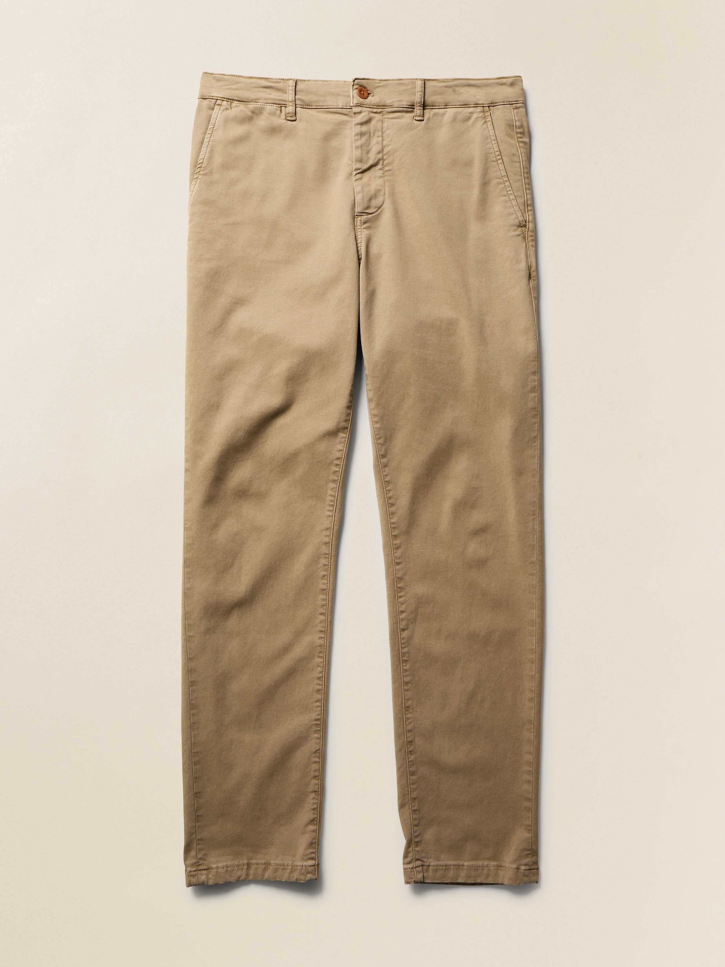 Olive beige pants on a beige background