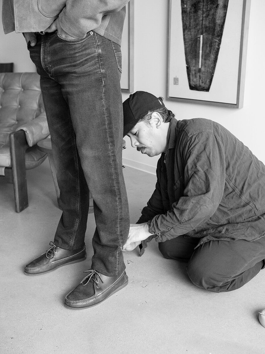 Fashion designer tailoring the fit of stretch terry pants