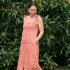 Native Hawaiian Designer Anna Kahalekulu posing in a nature wearing her own design, the Kendall Dress.