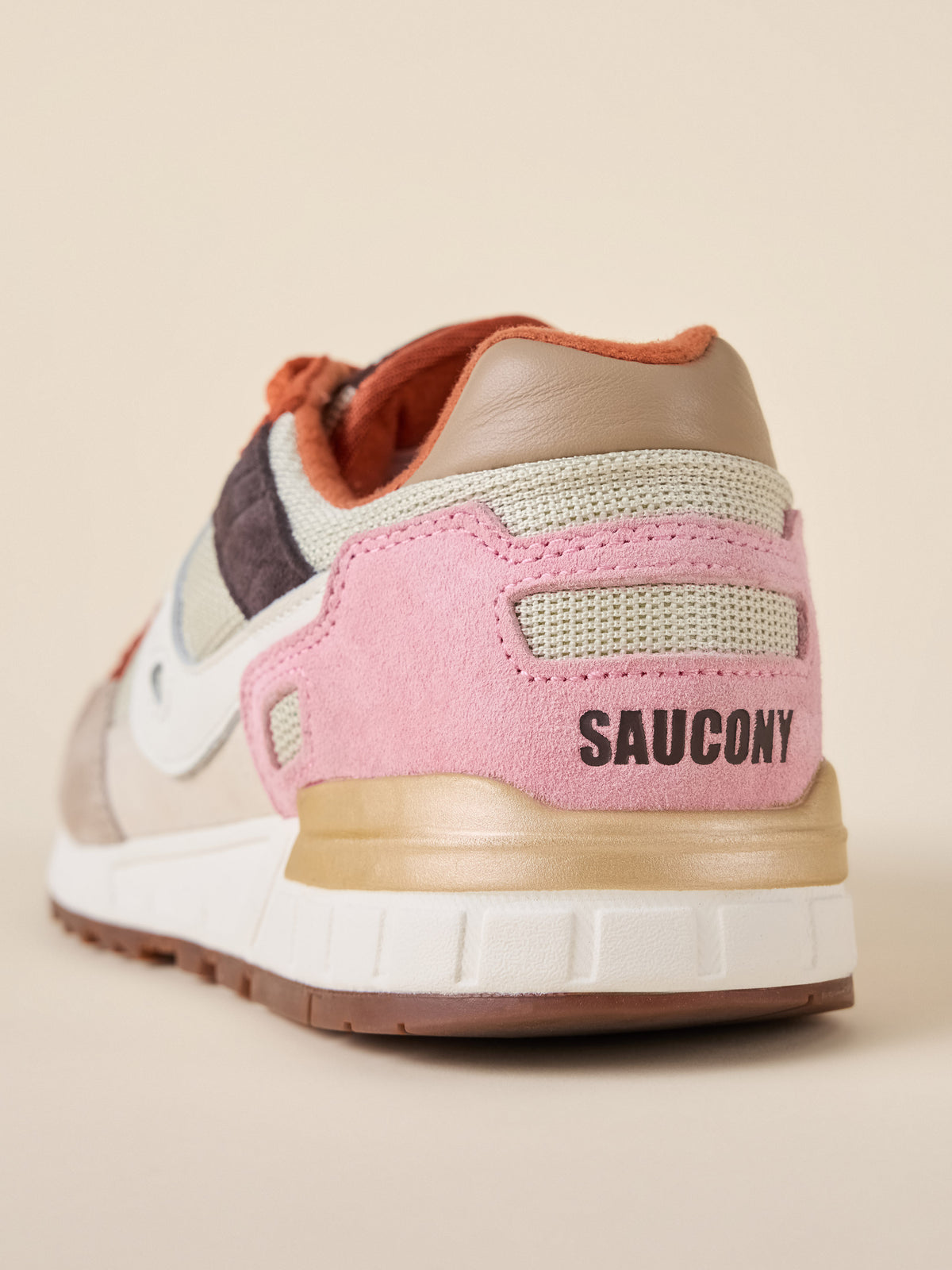 A multicolor Saucony sneaker viewed from behind, image 6 of 6