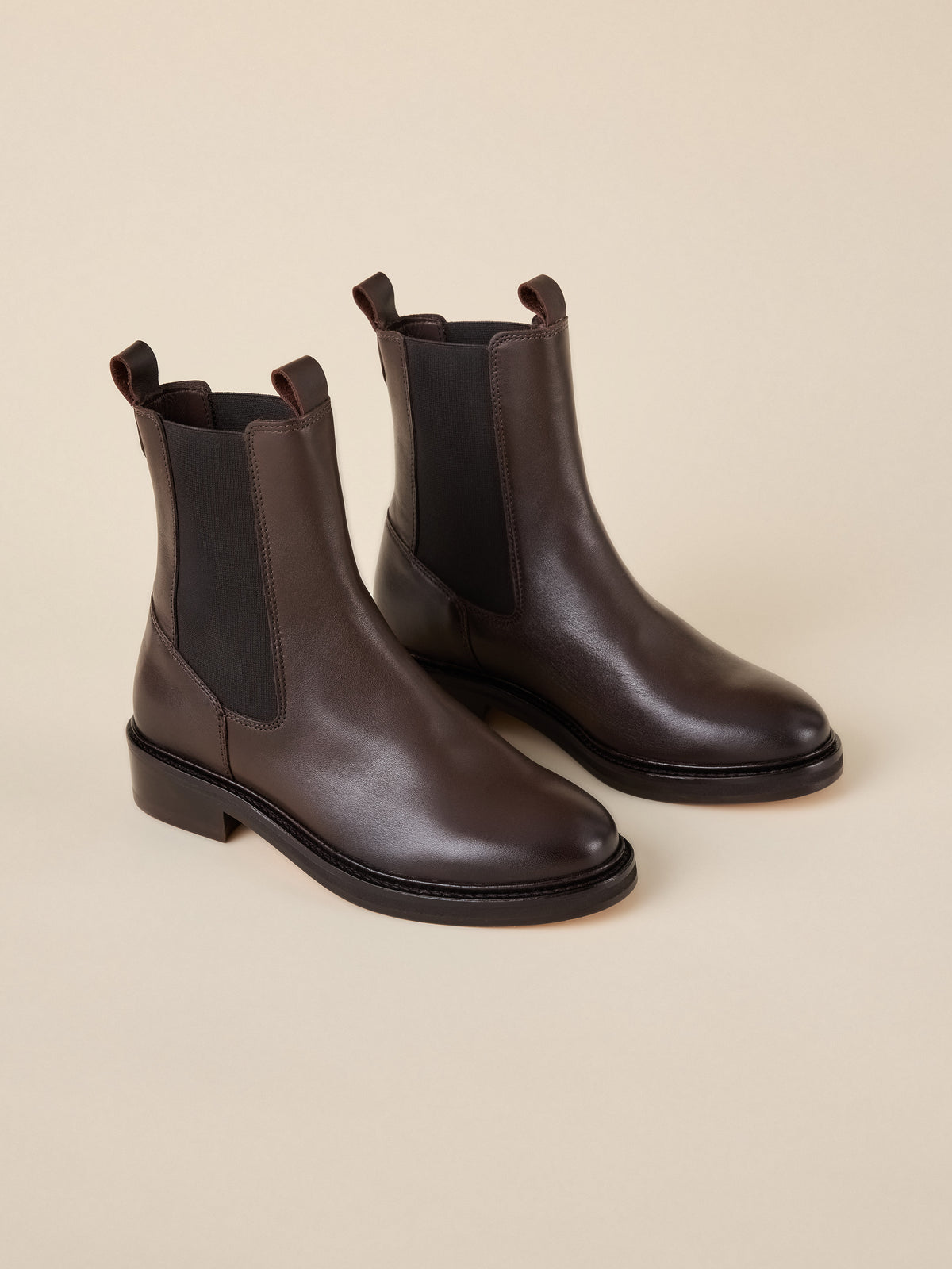 A pair of brown leather chelsea boots, image 1 of 4
