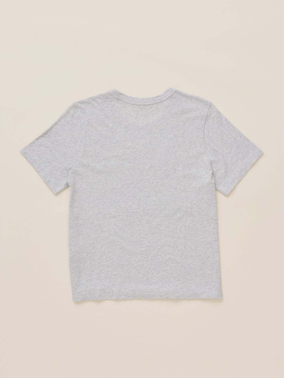 Light grey crewneck t-shirt against a beige background, image 7 of 7