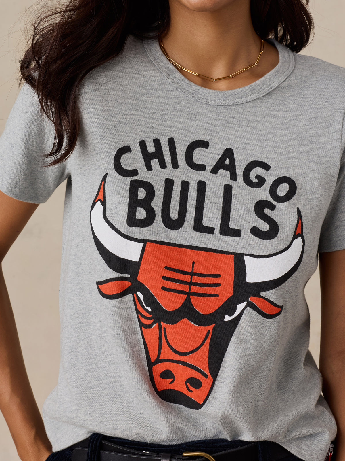 Close up of a woman wearing a grey Chicago Bulls tee, image 2 of 6