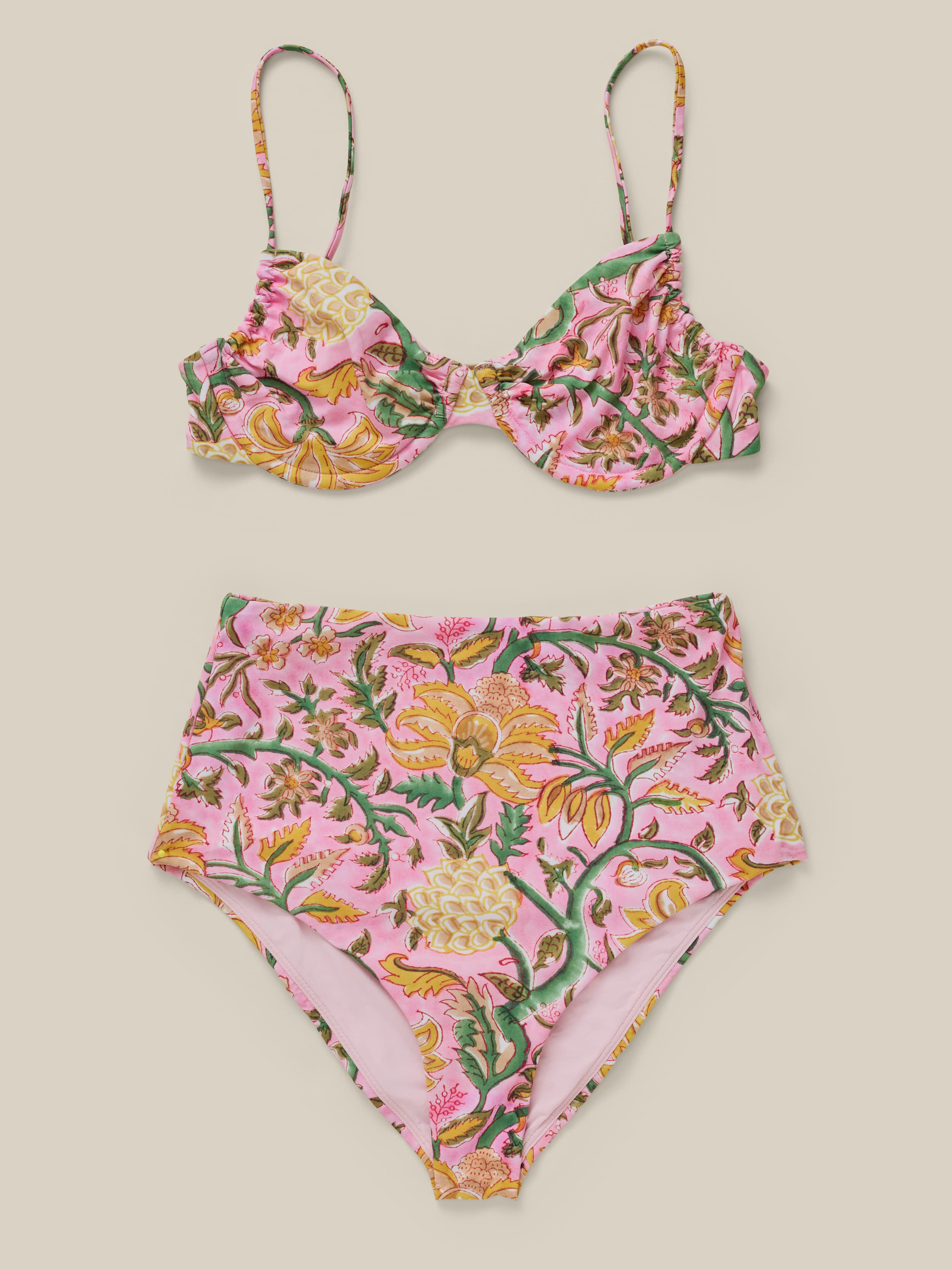 Floral bikini set on a beige background