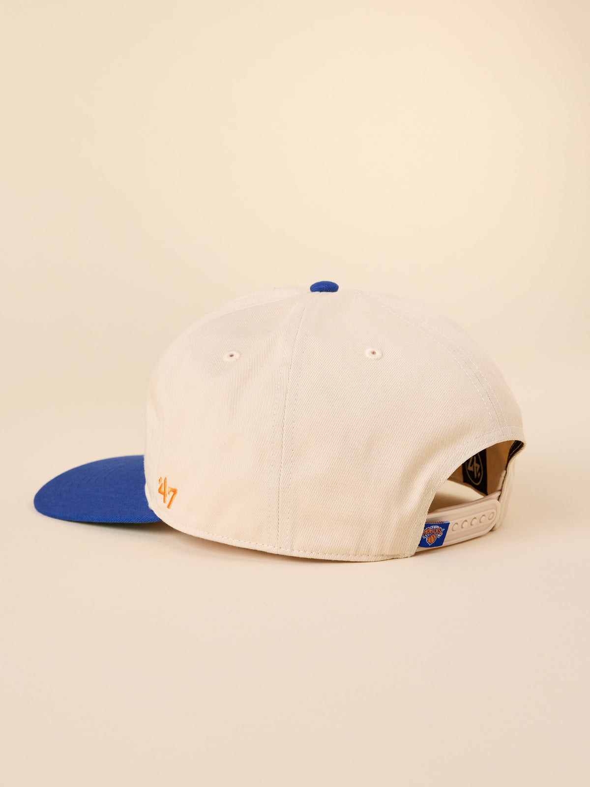 A beige and blue NY Knicks hat, image 3 of 3