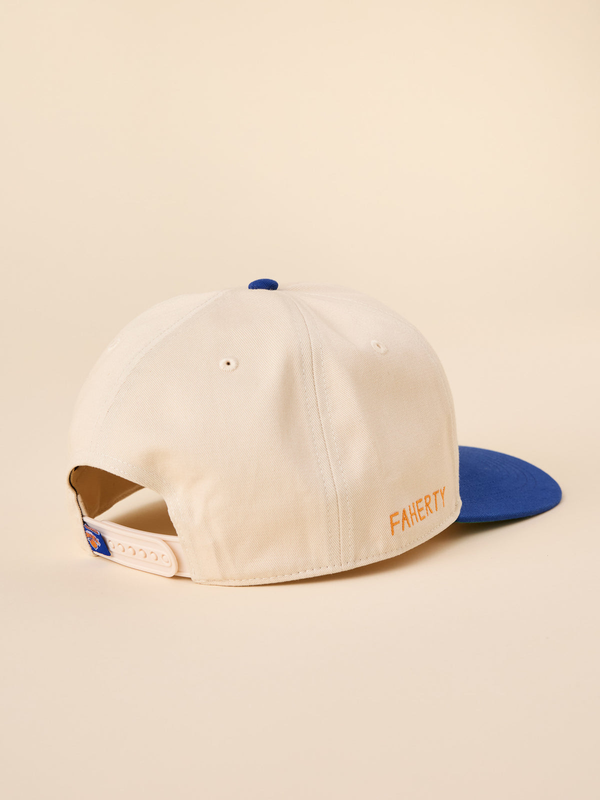 A beige and blue NY Knicks hat, image 2 of 3