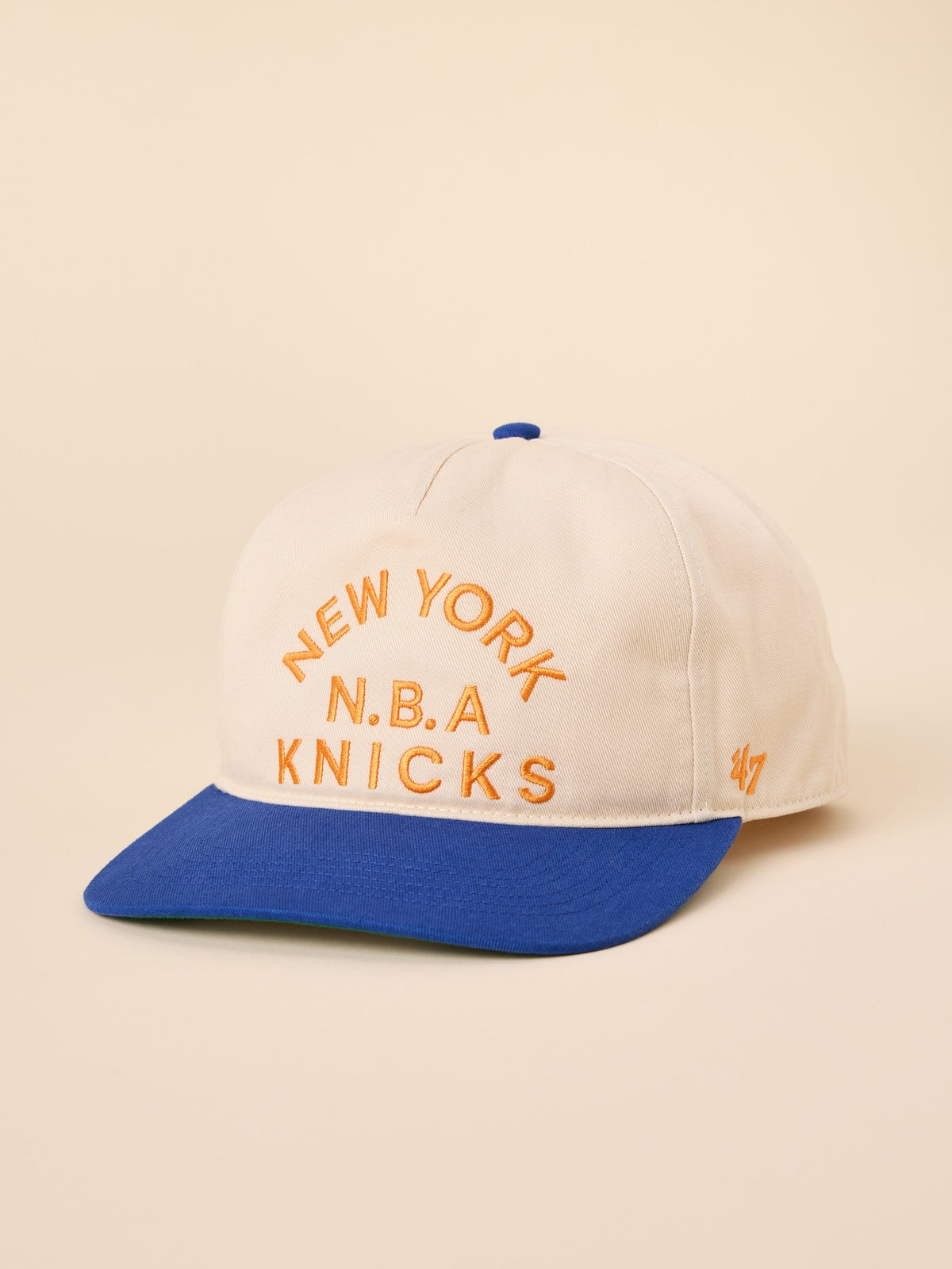 A beige and blue NY Knicks hat, image 1 of 3