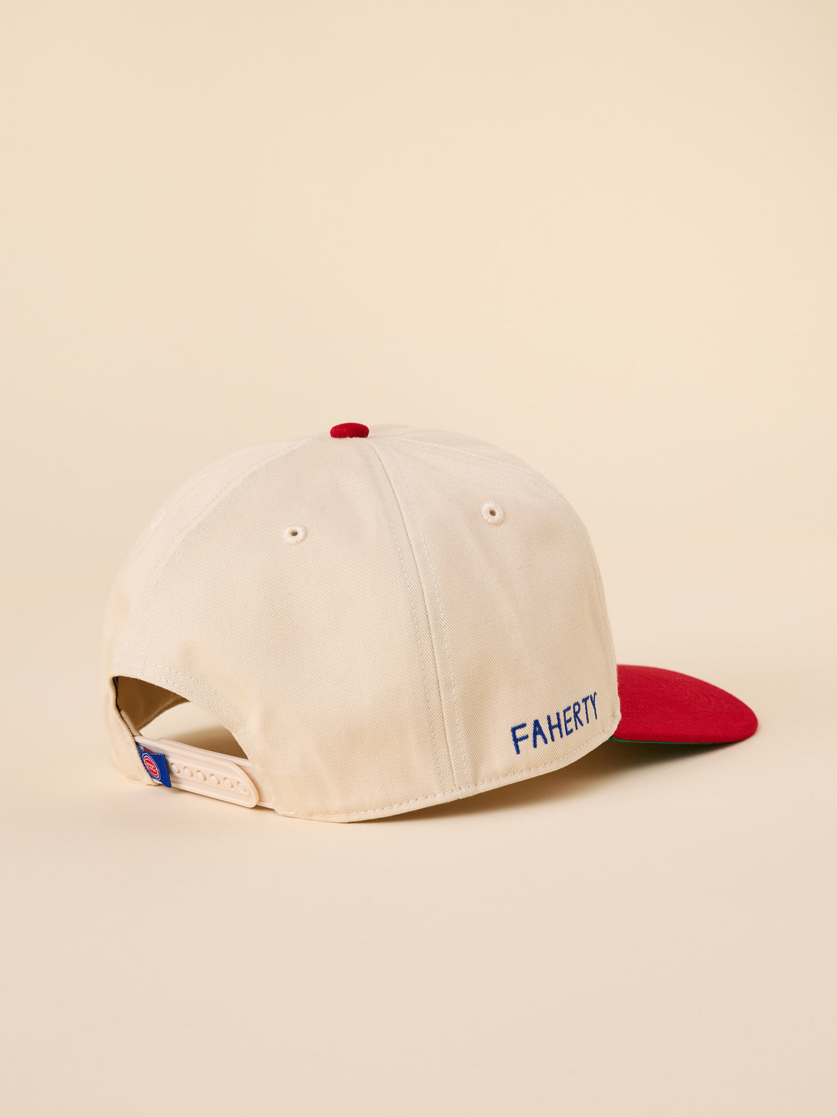 A beige and red Detroit Pistons hat, image 2 of 3