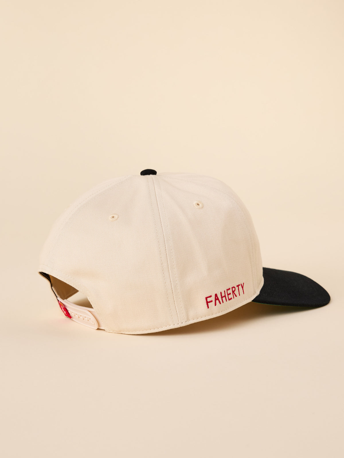 A beige and blue Houston Rockets hat, image 2 of 3