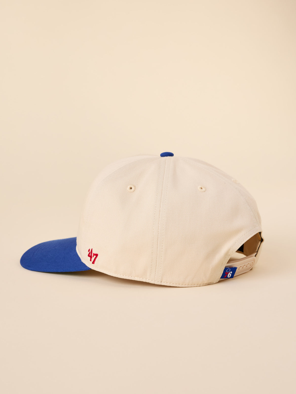 A beige and blue Philadelphia 76ers hat, image 3 of 3