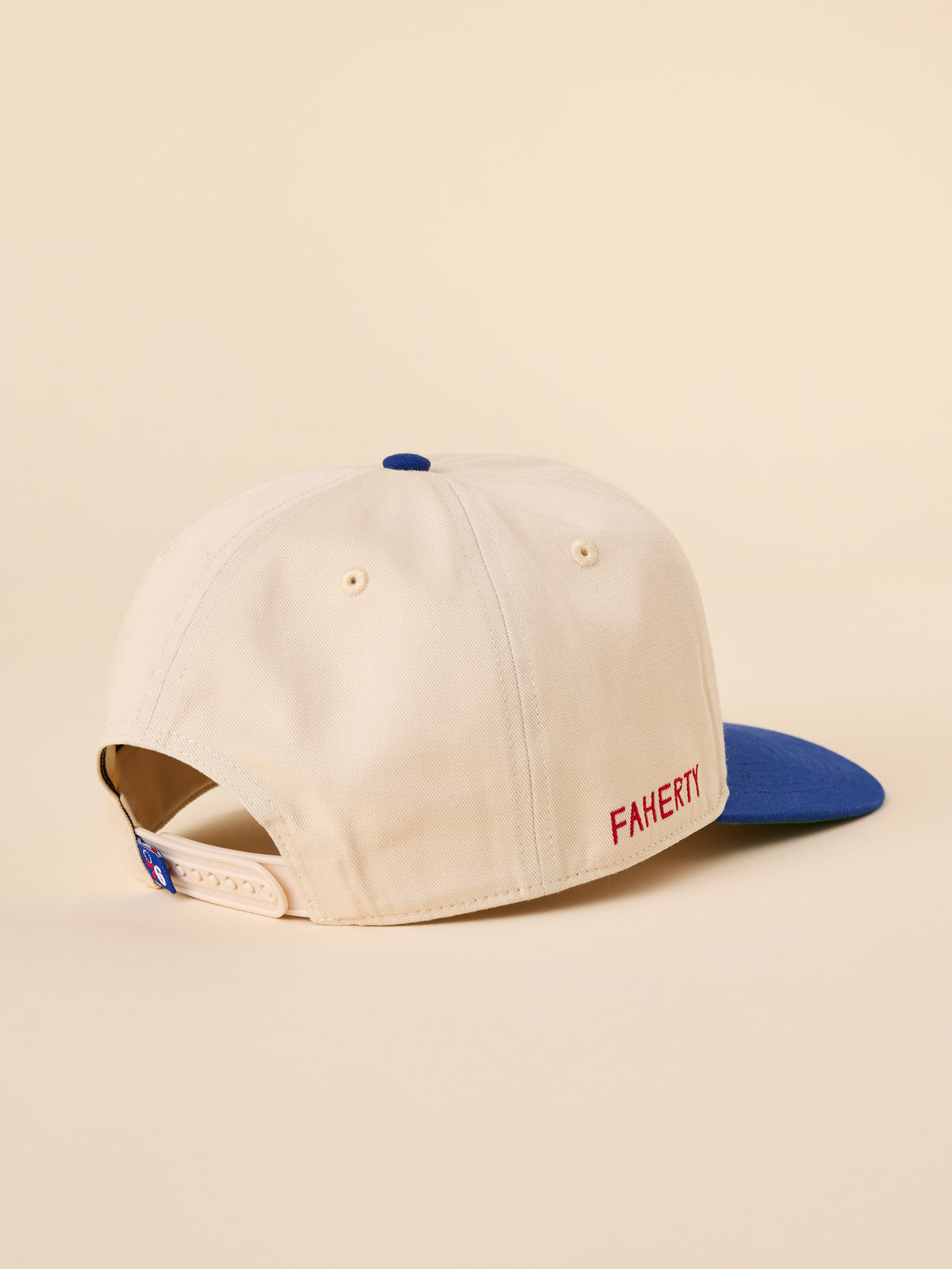 A beige and blue Philadelphia 76ers hat, image 2 of 3