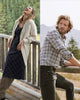 A man and woman wearing Faherty brand clothing.