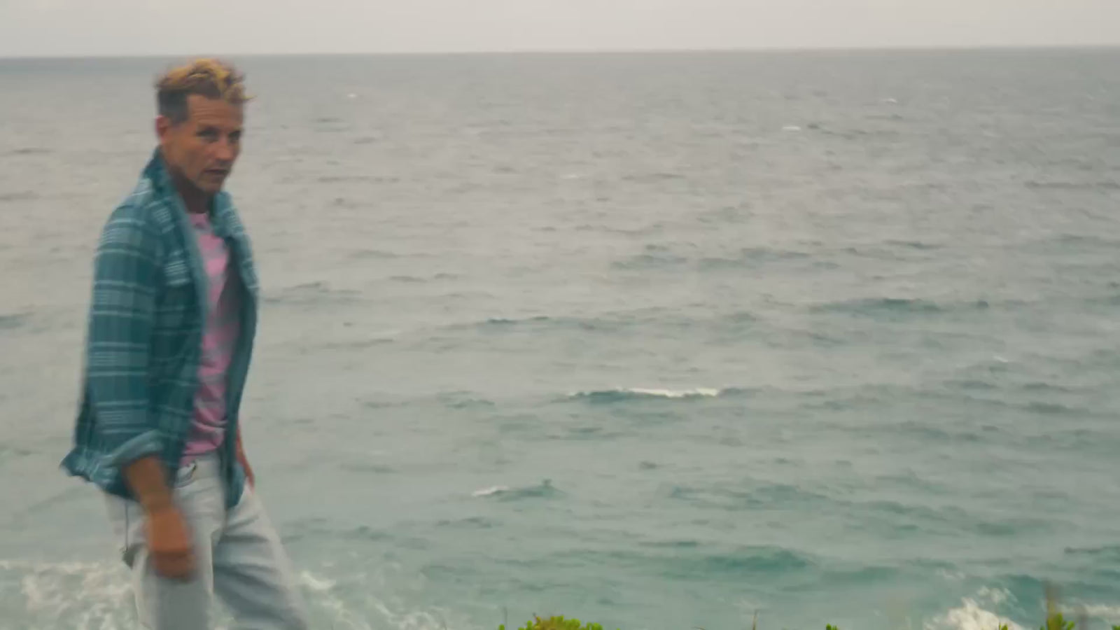 lifestyle footage of men in Byron Bay Australia wearing Faherty pants