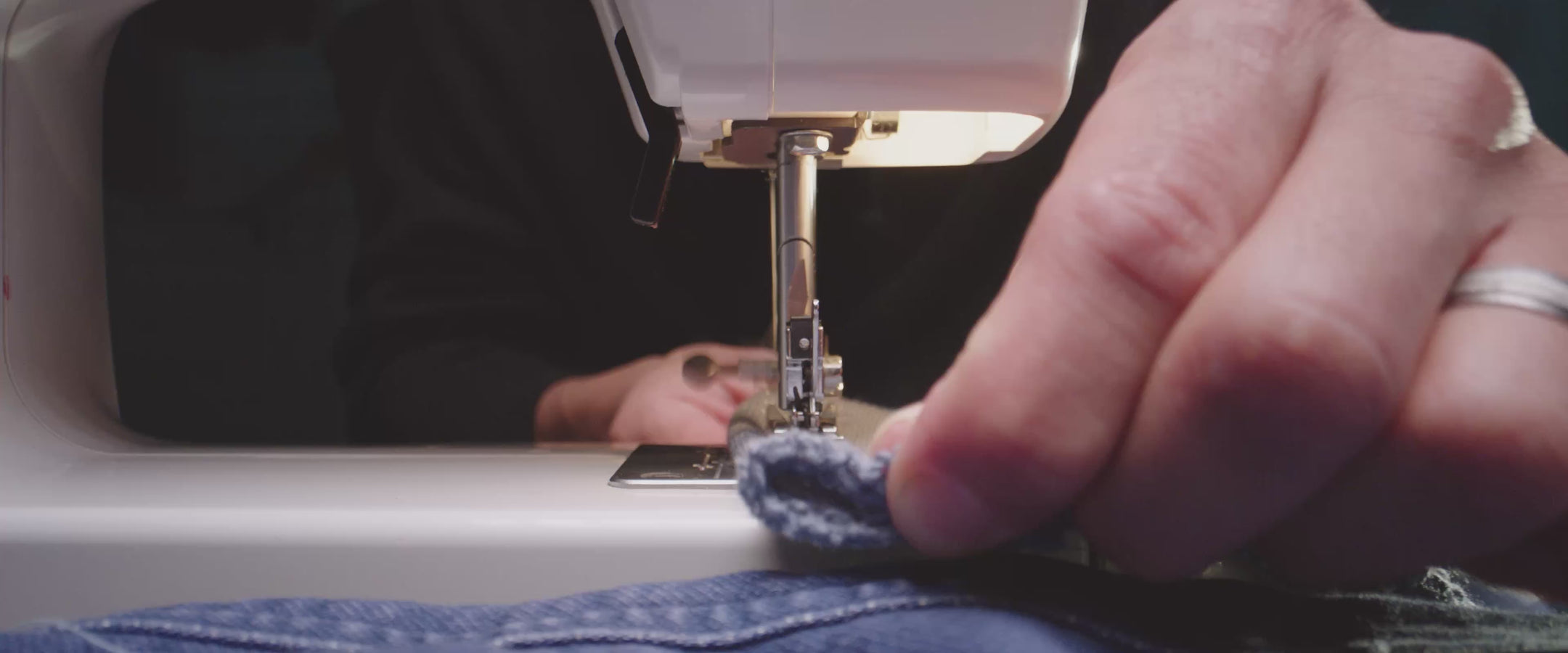 Faherty Design Studio Sequence: Close up shots of hands sewing and cutting patterns, lifestyle imagery moodboards and an assortment of proprietary fabrics.