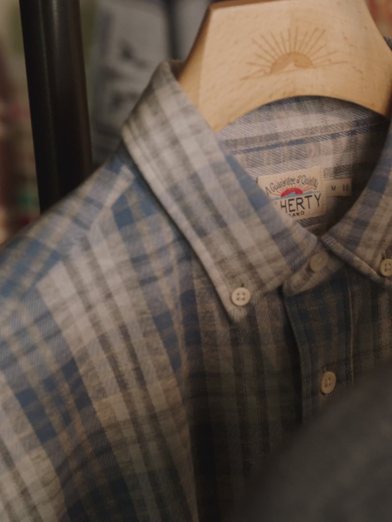 A video sequence of making the coastline knit shirt: a hand scoring a pattern, the pieces being cut and assembled, a fit model trying on the shirt